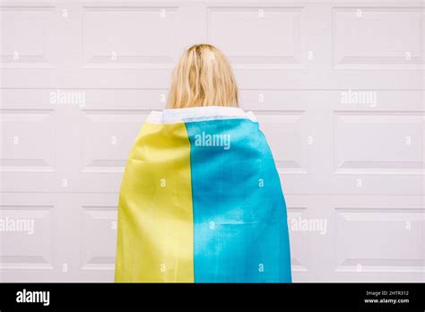 Ukrainian Blonde Haired Mature Woman From The Back With Blue And Yellow