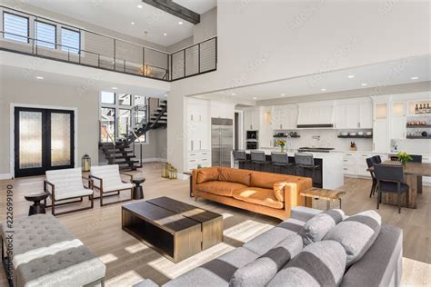 Beautiful Living Room Interior In New Luxury Home With Open Concept Floor Plan Shows Entry