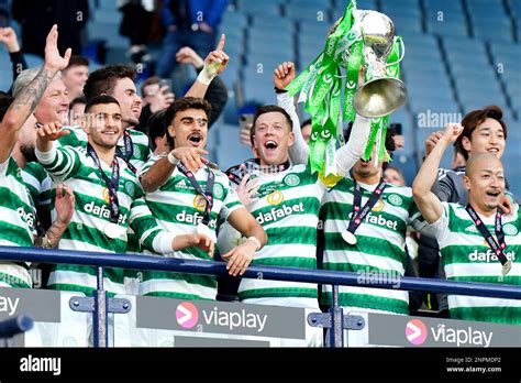 Celtic S Callum McGregor Lifts The Viaplay Sports Cup Trophy As His