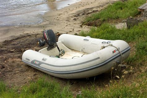 A Small Inflatable Dinghy On A Beach Editorial Stock Image Image Of