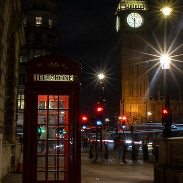 A Red Phone Booth At Night With Elizabeth Tower Sticker For Sale By