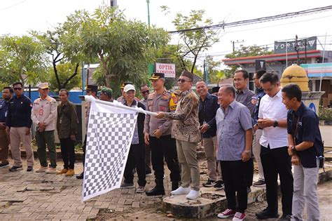 Pj Bupati Lepas Distribusi Logistik Pemilu 2024 Tampirai