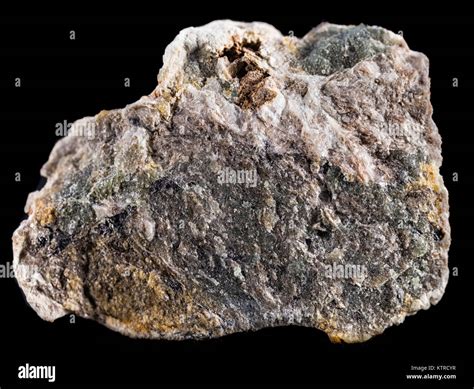 Ilmenite mineral on black background Stock Photo - Alamy