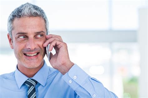 Premium Photo Happy Businessman Having A Phone Call