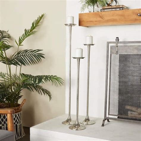 Litton Lane Silver Aluminum Tall Candle Holder Set Of The