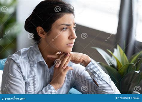 Head Shot Unhappy Thoughtful Indian Woman Thinking About Problems