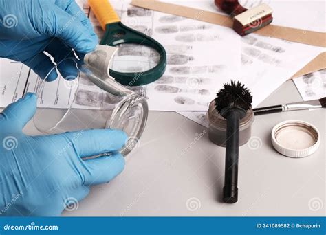 Forensic Fingerprint Analysis Criminalist Collects Latent Fingerprints