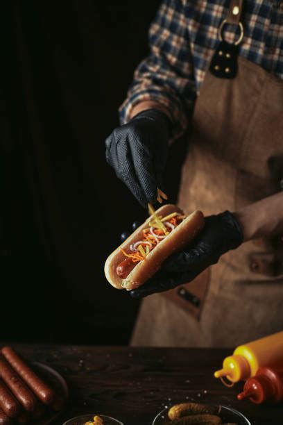 50 Man Eating Chili Dog Stock Photos Pictures And Royalty Free Images