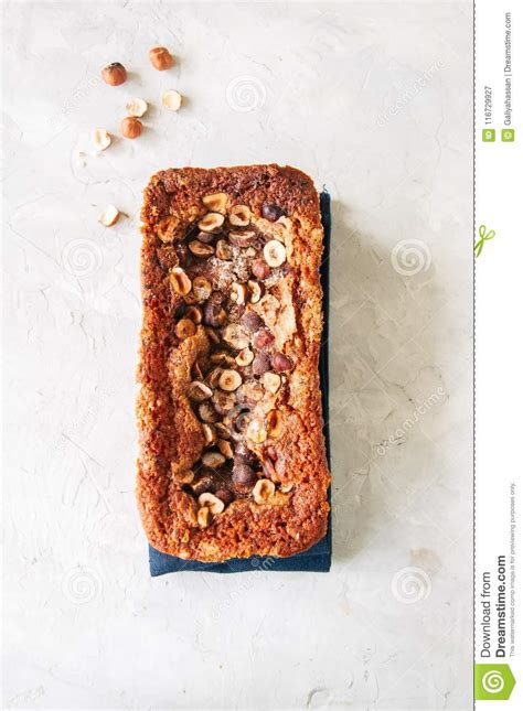 Pumpkin Espresso Bread With Hazelnuts On A Blue Napkin On A Whit Stock
