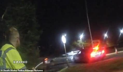 Moment Impatient Driver Smashes Into Police Car After Forcing His Way