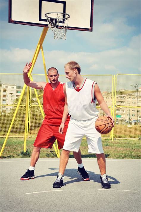Two Basketball Players Smiling On The Court Stock Photo Image Of