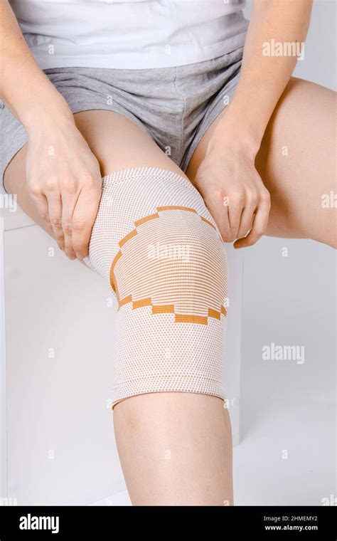 Knee Support Brace On Leg Isolated On White Background Elastic