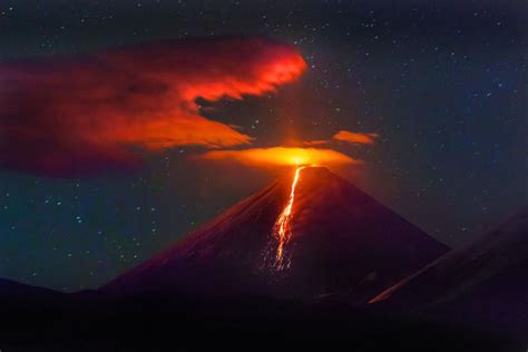 Volcano Erupting At Night