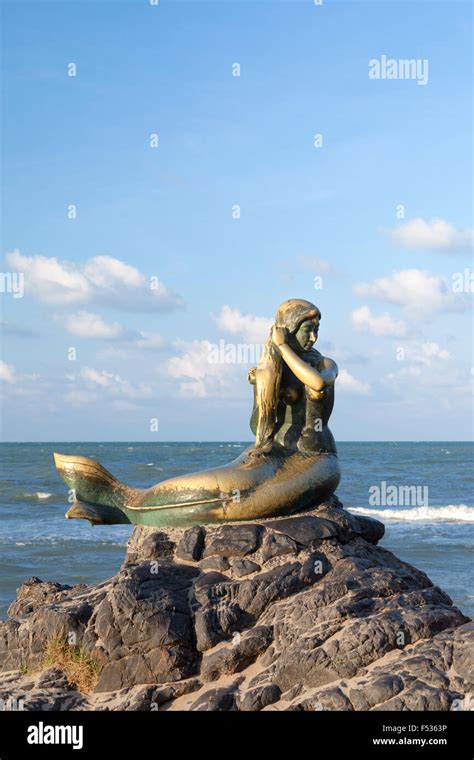 Golden mermaid statue on Samila beach, Songkhla ,Thailand Stock Photo ...