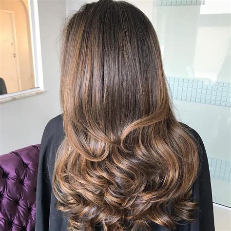 Classic Curls At The Ends Of Long Layers While The Weightiness Of Long Layered Haircuts Can