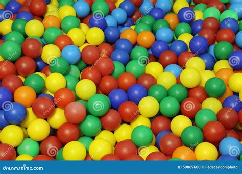 Plastic balls in a pool stock photo. Image of backgrounds - 59869600