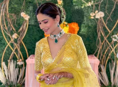Aneri Vajanis Stunning Yellow Saree With Deep Neckline Blouse