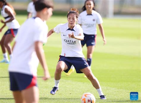 Chinese Footballer Li Mengwen Attends Training Session At Paris Saint