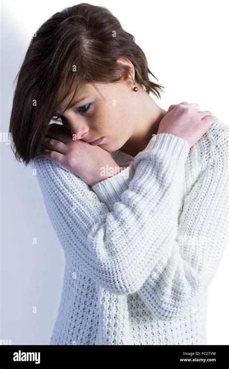 Sad Pretty Brunette Thinking With Arms Crossed Stock Photo Alamy