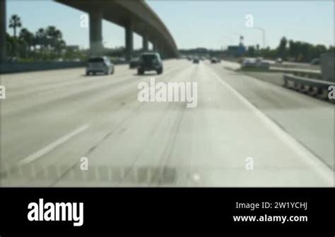 Driving On Intercity Freeway In Los Angeles California Usa Defocused View From Car Thru Glass