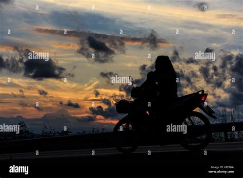 Woman Motorcycle Silhouette Hi Res Stock Photography And Images Alamy