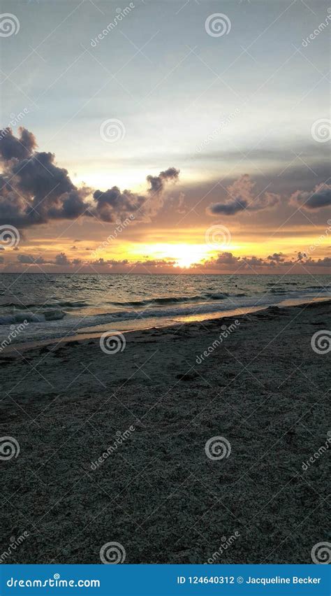 Sunset at Englewood Beach stock photo. Image of beach - 124640312