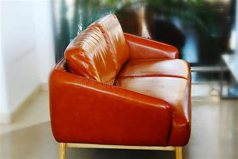 Red Leather Sofa with Wooden Legs. Vintage Style Sofa Stock Photo - Image of upholstery, style ...