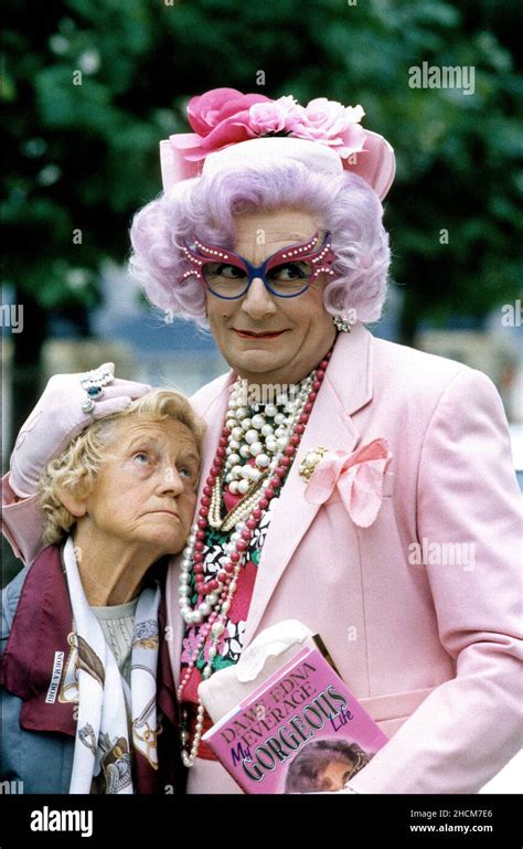 Australian comedy actor Barry Humphries as Dame Edna Everage with Emily ...