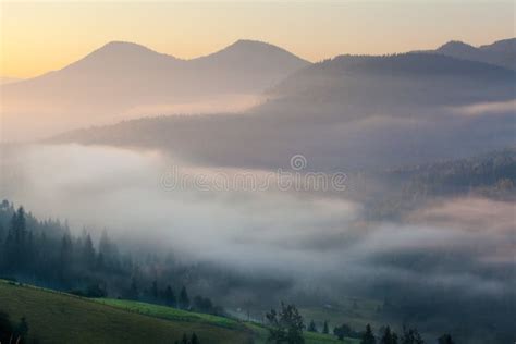 Amazing Scenery Of Idyllic Countryside With Rolling Hills Veiled In