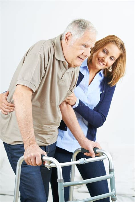 Physiotherapist Helping Woman On Treadmill Stock Image Image Of