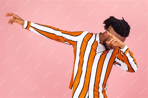 Premium Photo Trendy Afro American Man Making Dab Dance Move