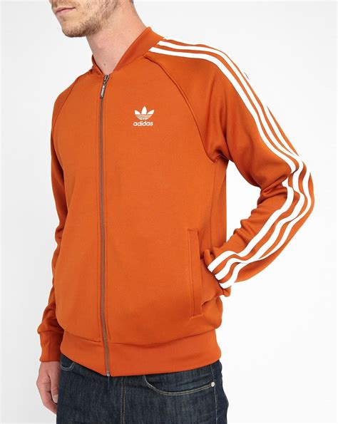 Adidas Earth Track Nylon Jacket in Orange for Men | Lyst