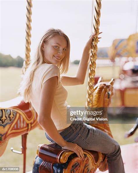 Girl Riding Carousel Horse Photos And Premium High Res Pictures Getty