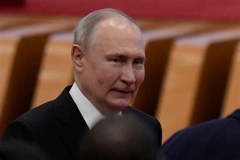 Russian President Putin And Chinese Leader Xi Meet In Beijing And Call