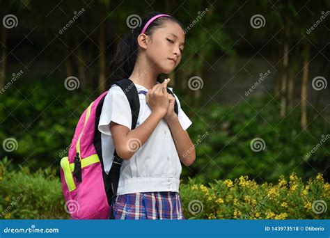 Prep Diverse Female Student In Prayer With Books Stock Photo Image Of