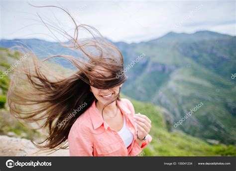 Hair Blowing In Wind Stock Photo by ©shevtsovy 155041234