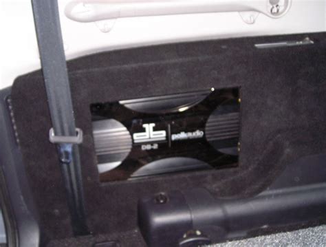 Как снять усилитель звука паджеро 4