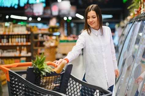 Sale Shopping Consumerism And People Concept Woman With Food Basket At Grocery Store Or