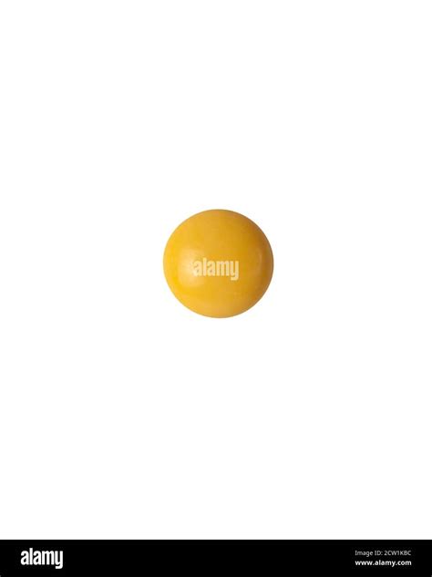 Round Yellow Pill On White Background Isolated Photo Pharmaceutical