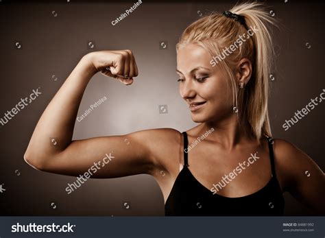 11181 Woman Flexing Biceps Immagini Foto Stock E Grafica Vettoriale