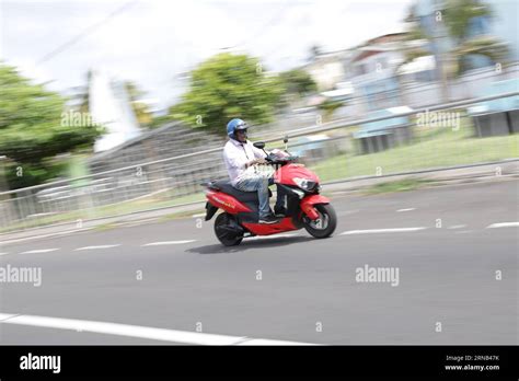 Panning Is A Photographic Technique That Combines A Slow Shutter Speed
