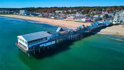 Aerial of Old Orchard Beach Pier in Fall Over Maine Ocean and View of ...