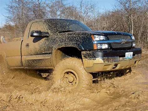 Big Truck Big Tiers Slinging Mud To The Sky The Lacs Lifted Chevy