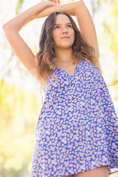 Pretty Brunette Standing Arms Raised Stock Photo Image Of Casual