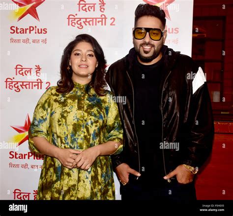 Indian Playback Singer Sunidhi Chauhan And Rapper Badshah Pose At The