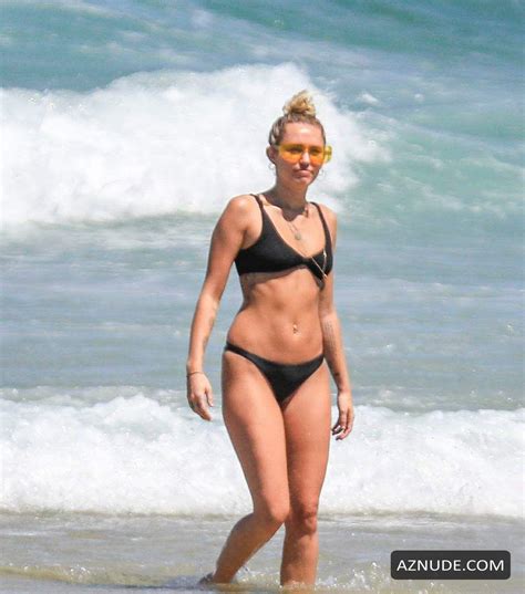 Miley Cyrus Wears A Black Bikini At The Beach In Byron Bay Australia Aznude