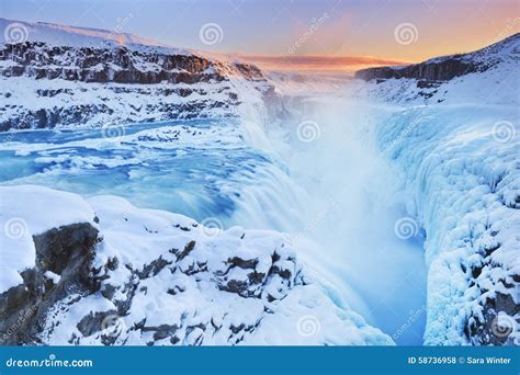 Frozen Gullfoss Falls In Iceland In Winter At Sunset Stock Photo