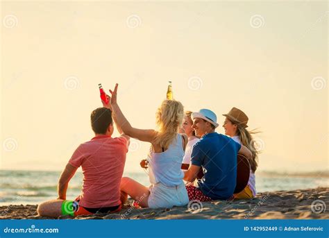 Group Of Friends Play On The Beach Stock Image Image Of Holiday