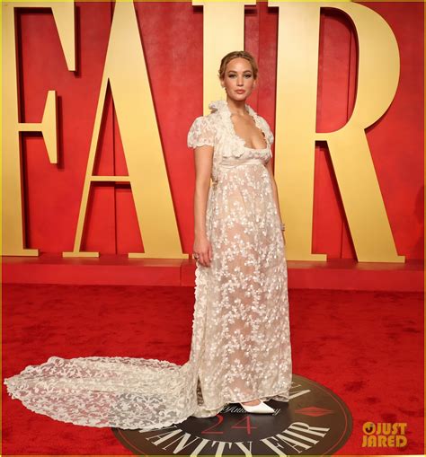 Jennifer Lawrence Goes Sheer Wears Vintage Dress With Long Train To