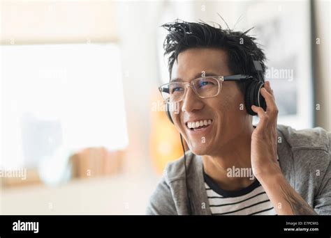 Cheerful Man Listening To Music Stock Photo Alamy